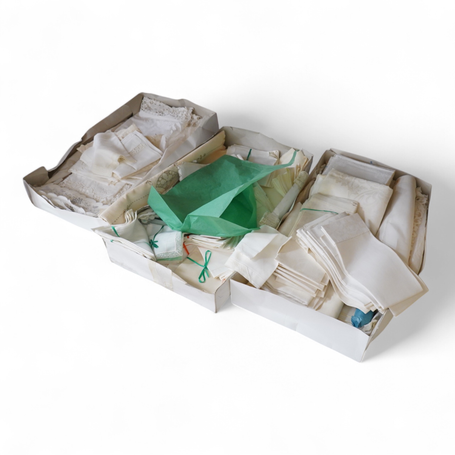 A collection of mixed damask embroidered and cutworked table cloths, napkin sets, hand towels and mats (in 3 boxes)